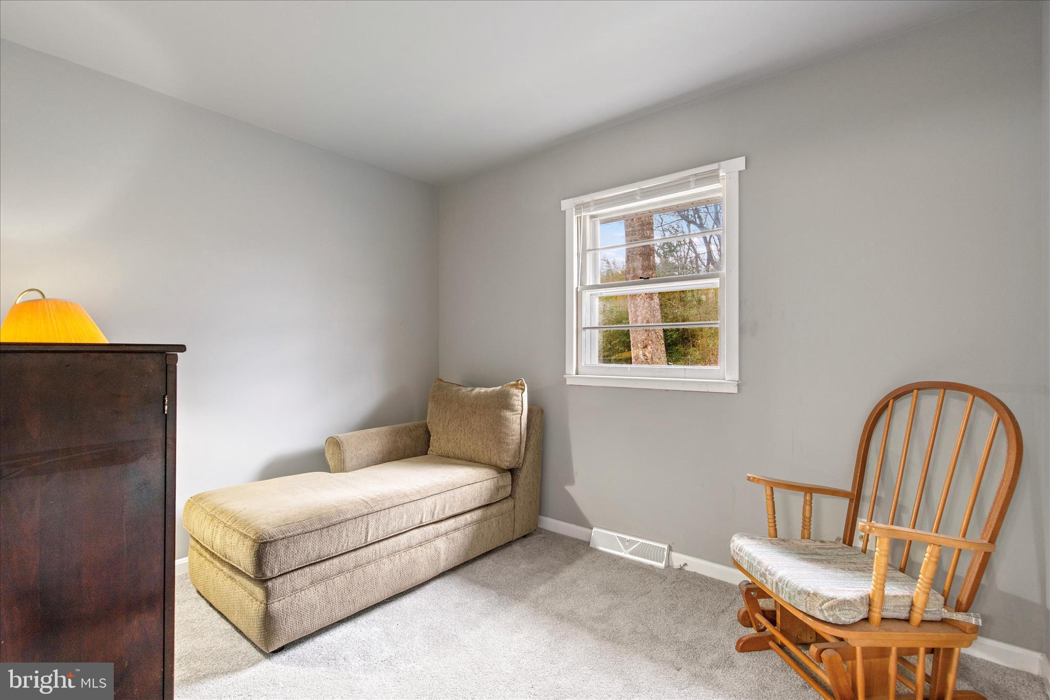 802 Lucky Road Severn, MD 21144 - Photo 22 of 32 a living room with a couch and a window