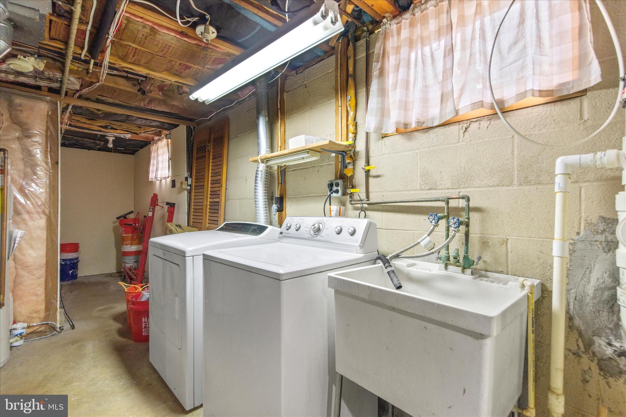 802 Lucky Road Severn, MD 21144 - Photo 28 of 32 a bathroom with a sink and a mirror