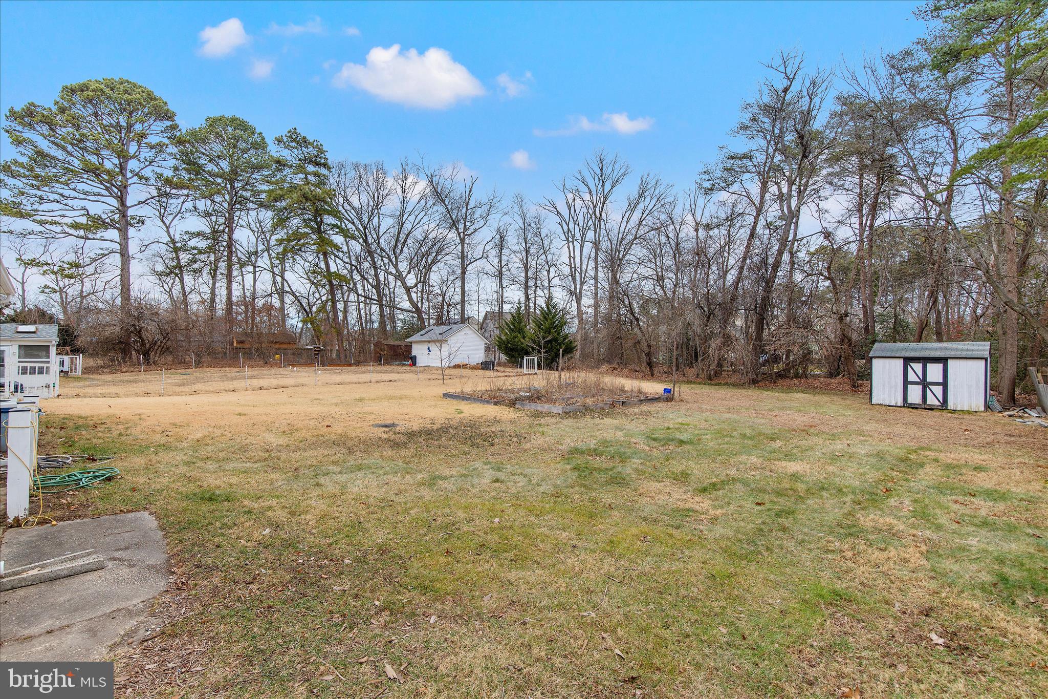 802 Lucky Road Severn, MD 21144 - Photo 29 of 32 a view of open space with trees in the background