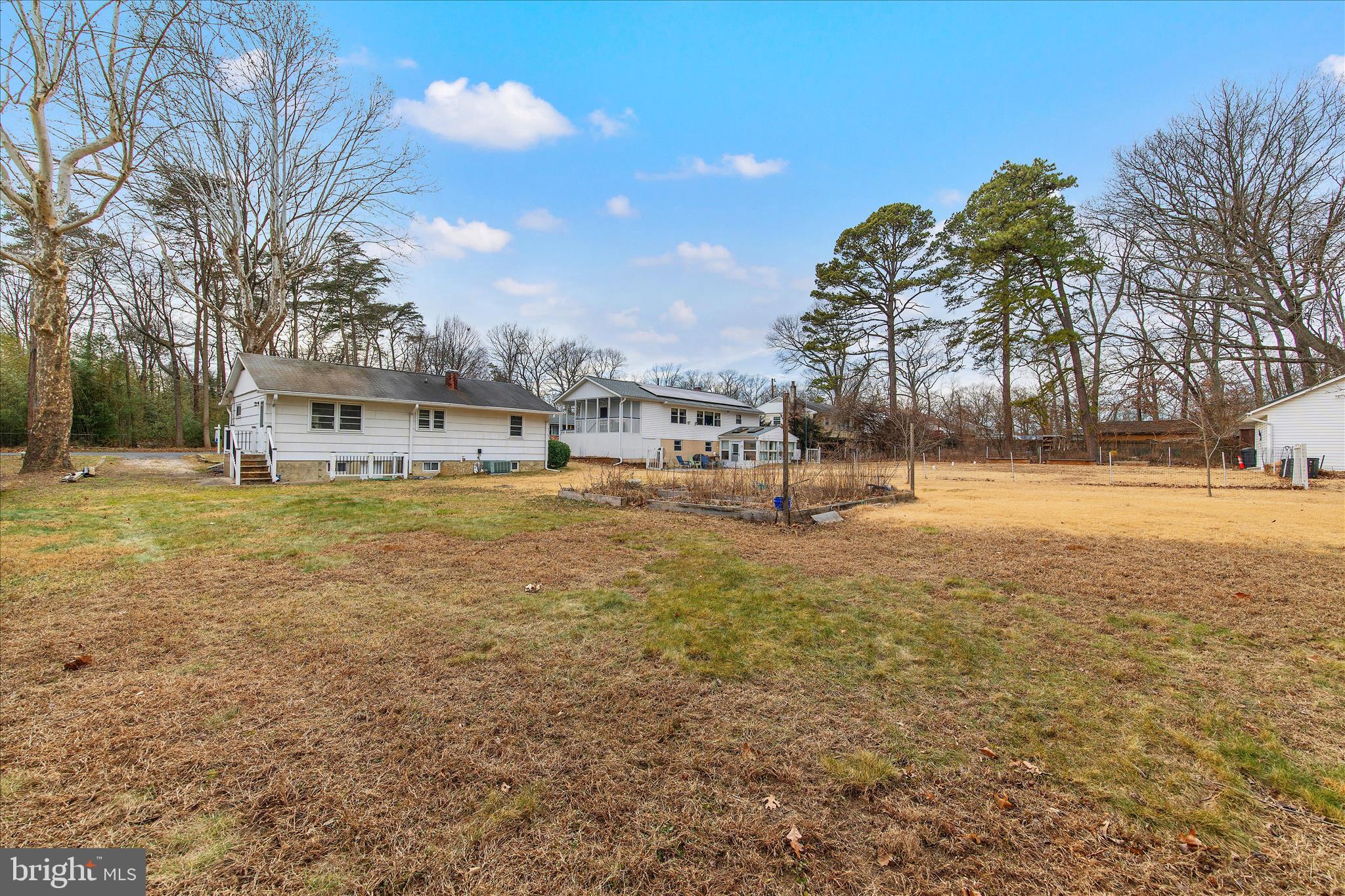 802 Lucky Road Severn, MD 21144 - Photo 31 of 32 a view of a building with a yard
