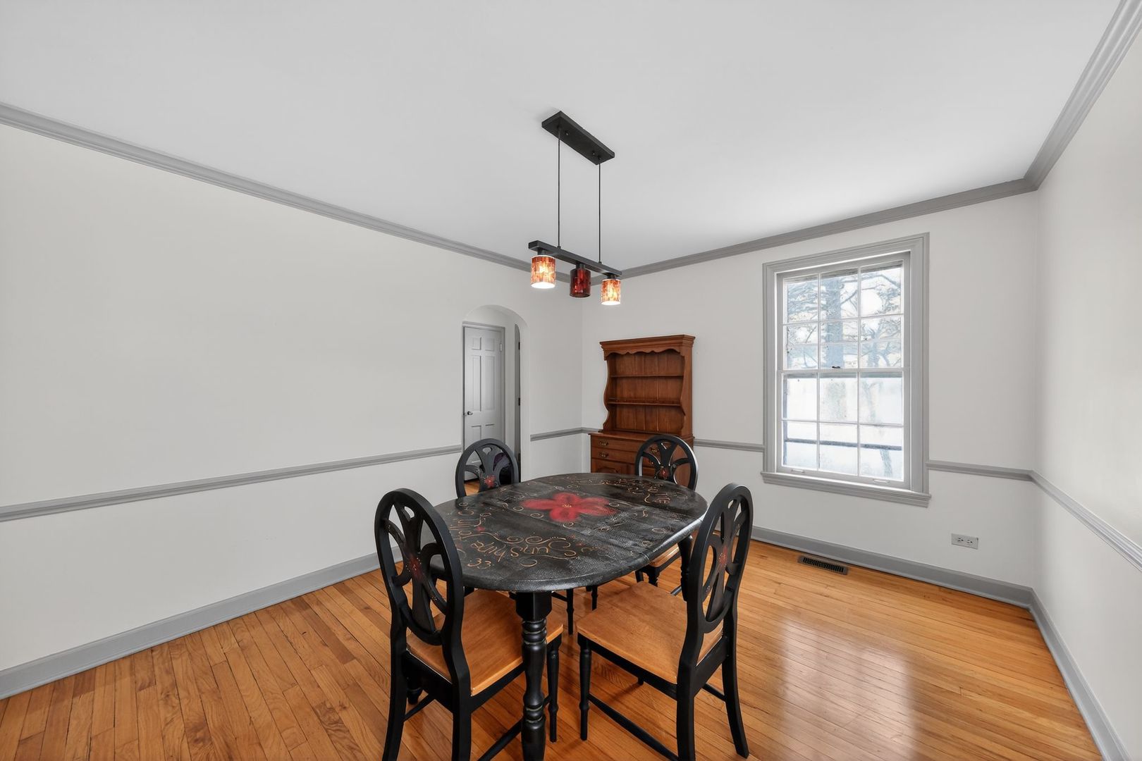 521 Deerfield Road Deerfield, IL 60015 - Photo 15 of 30 a view of a dining room with furniture window and wooden floor
