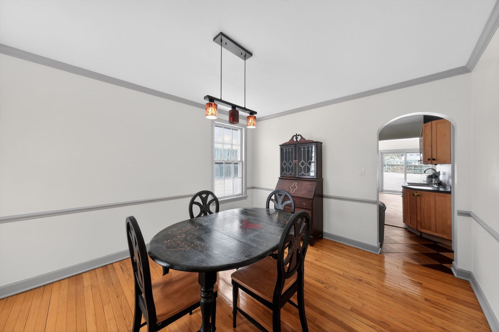 521 Deerfield Road Deerfield, IL 60015 - Photo 17 of 30 a view of a dining room with furniture and wooden floor