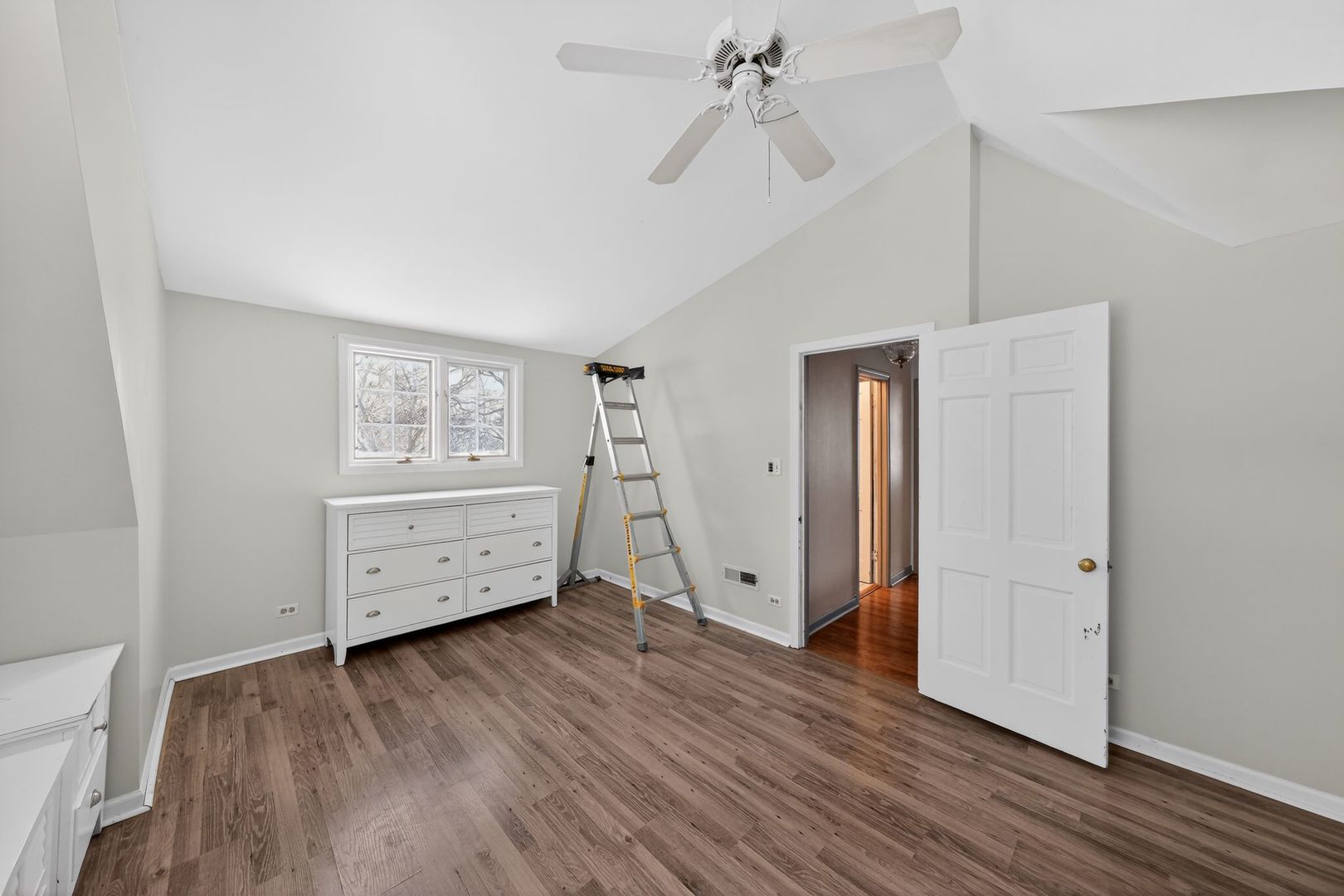 521 Deerfield Road Deerfield, IL 60015 - Photo 18 of 30 an empty room with wooden floor closet and windows