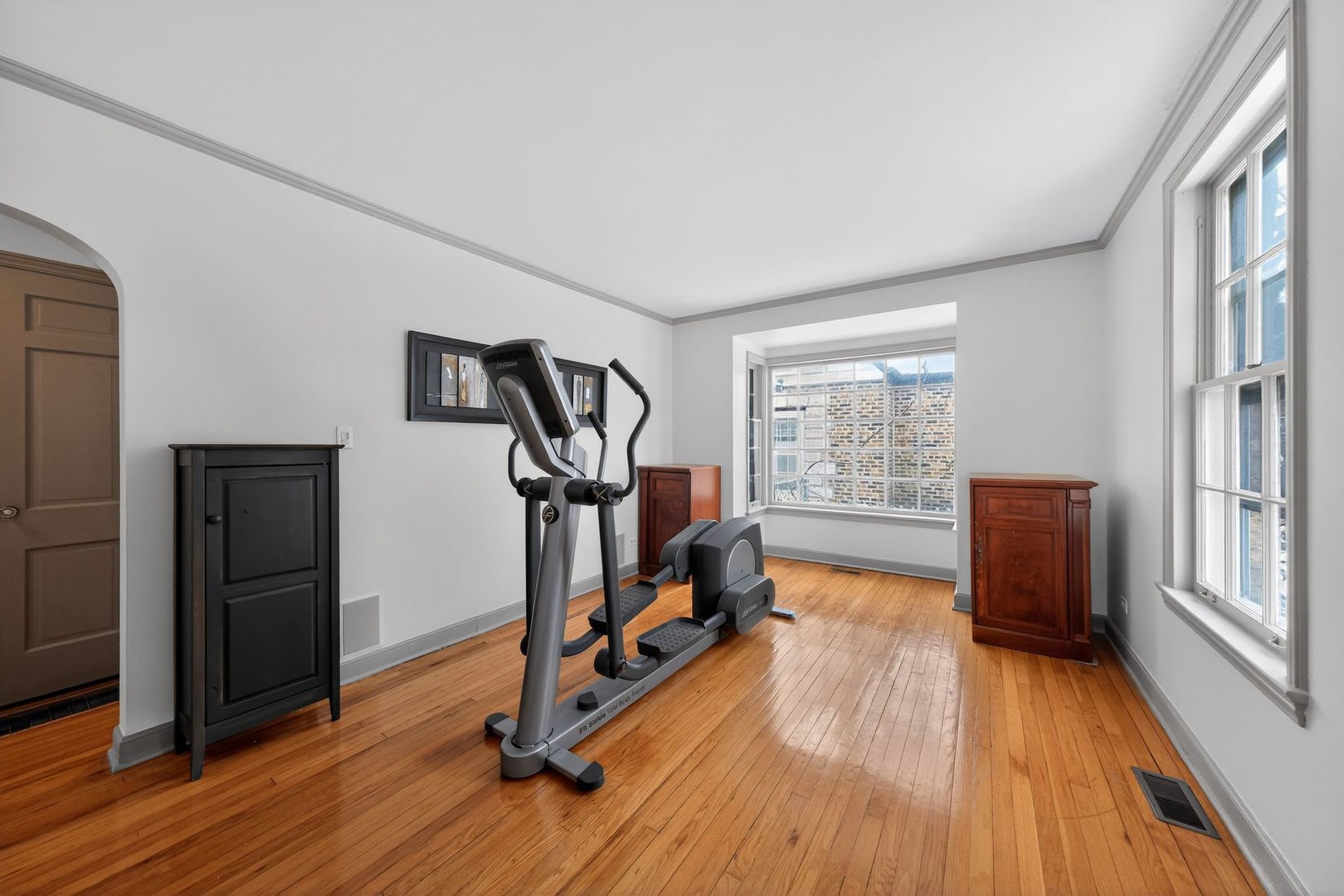521 Deerfield Road Deerfield, IL 60015 - Photo 27 of 30 a view of a room with gym equipment and wooden floor
