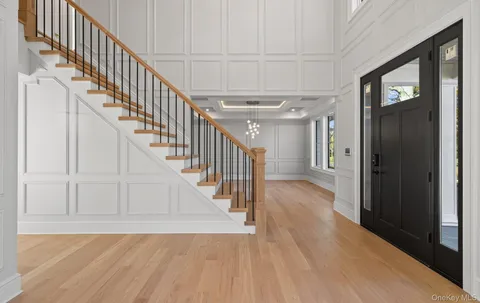 a view of staircase with wooden floor and staircase