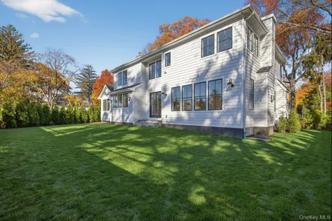 a view of a building with a yard