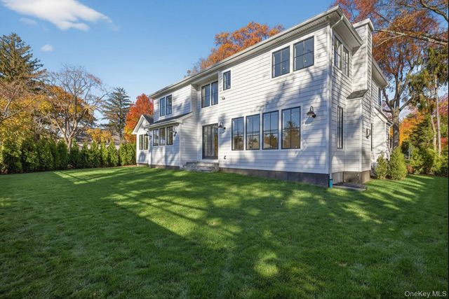 a view of a building with a yard