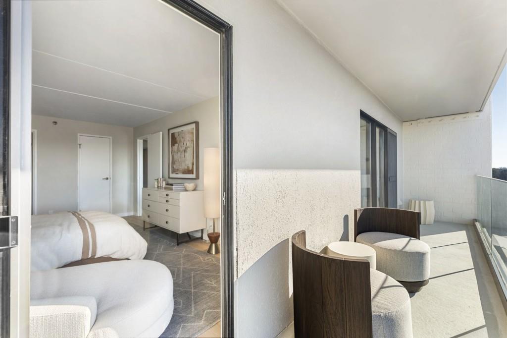 2460 Peachtree Road Northeast, Unit 1105 Atlanta, GA 30305 - Photo 26 of 51 a living room with furniture and a air conditioner vent