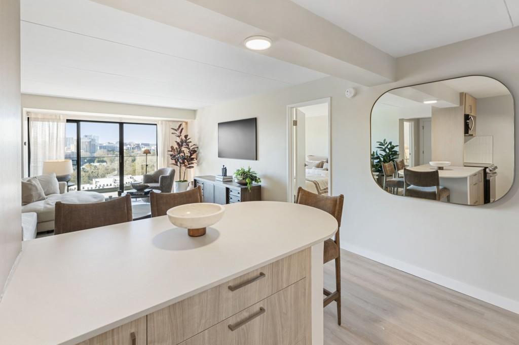 2460 Peachtree Road Northeast, Unit 1105 Atlanta, GA 30305 - Photo 6 of 51 a view of a living room and dining room