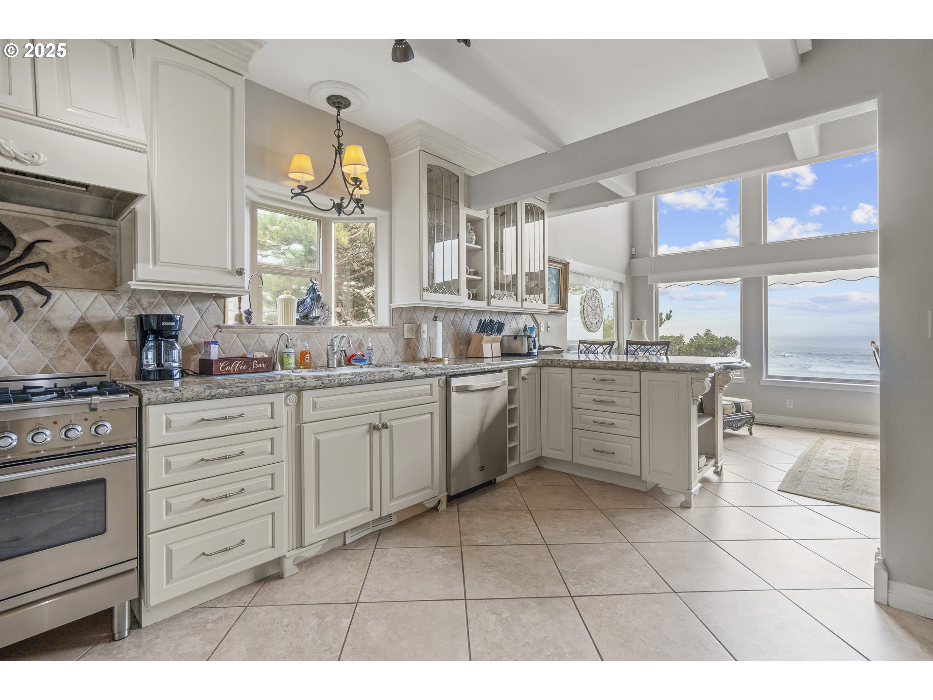 a kitchen with cabinets and window