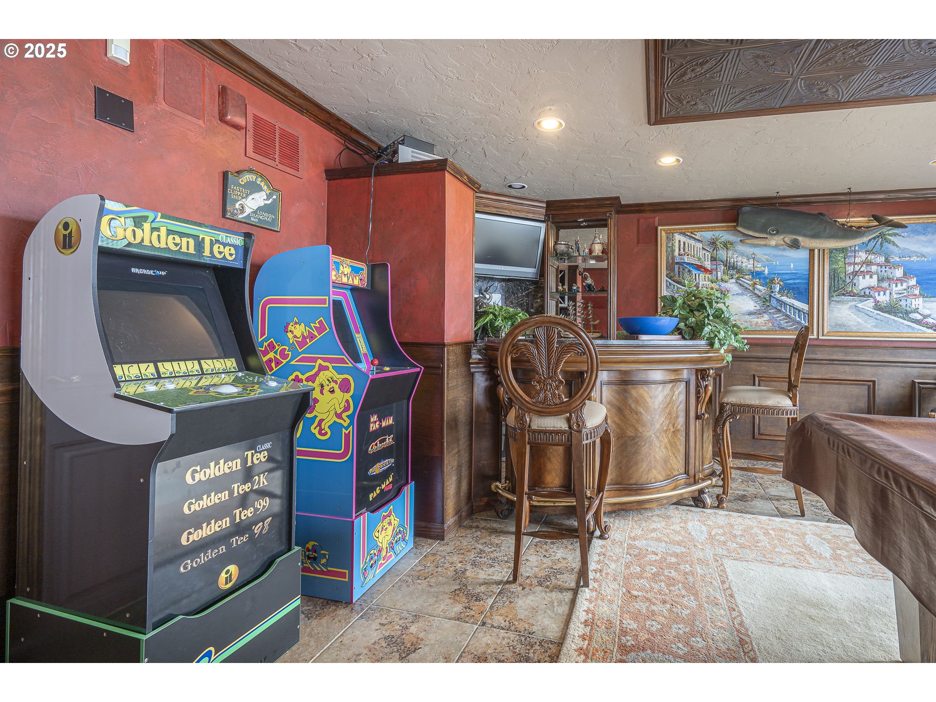 2325 Southwest Bard Loop Lincoln City, OR 97367 - Photo 3 of 28 a living room with furniture a rug and a flat screen tv
