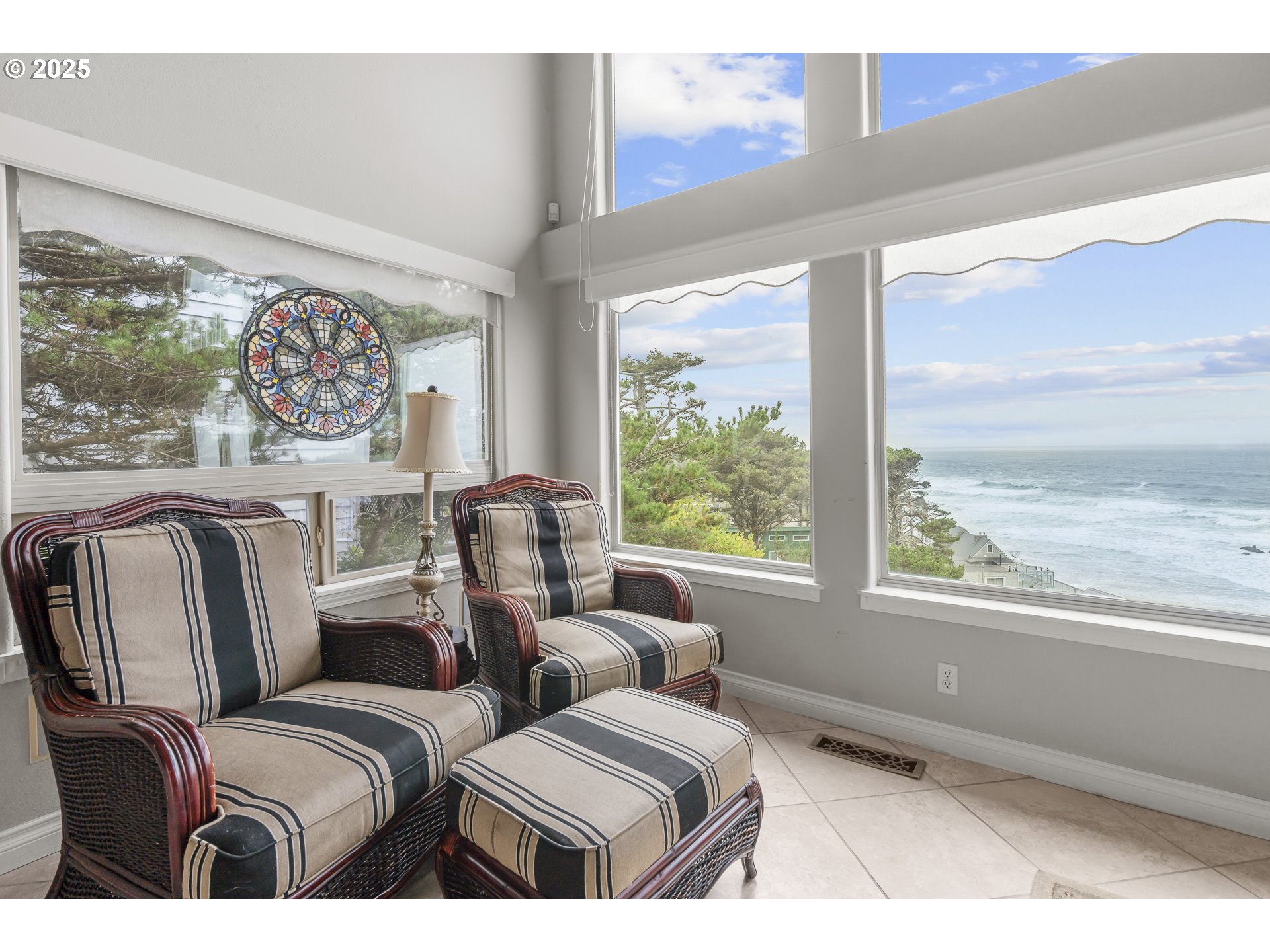 2325 Southwest Bard Loop Lincoln City, OR 97367 - Photo 10 of 28 a living room with furniture and a large window