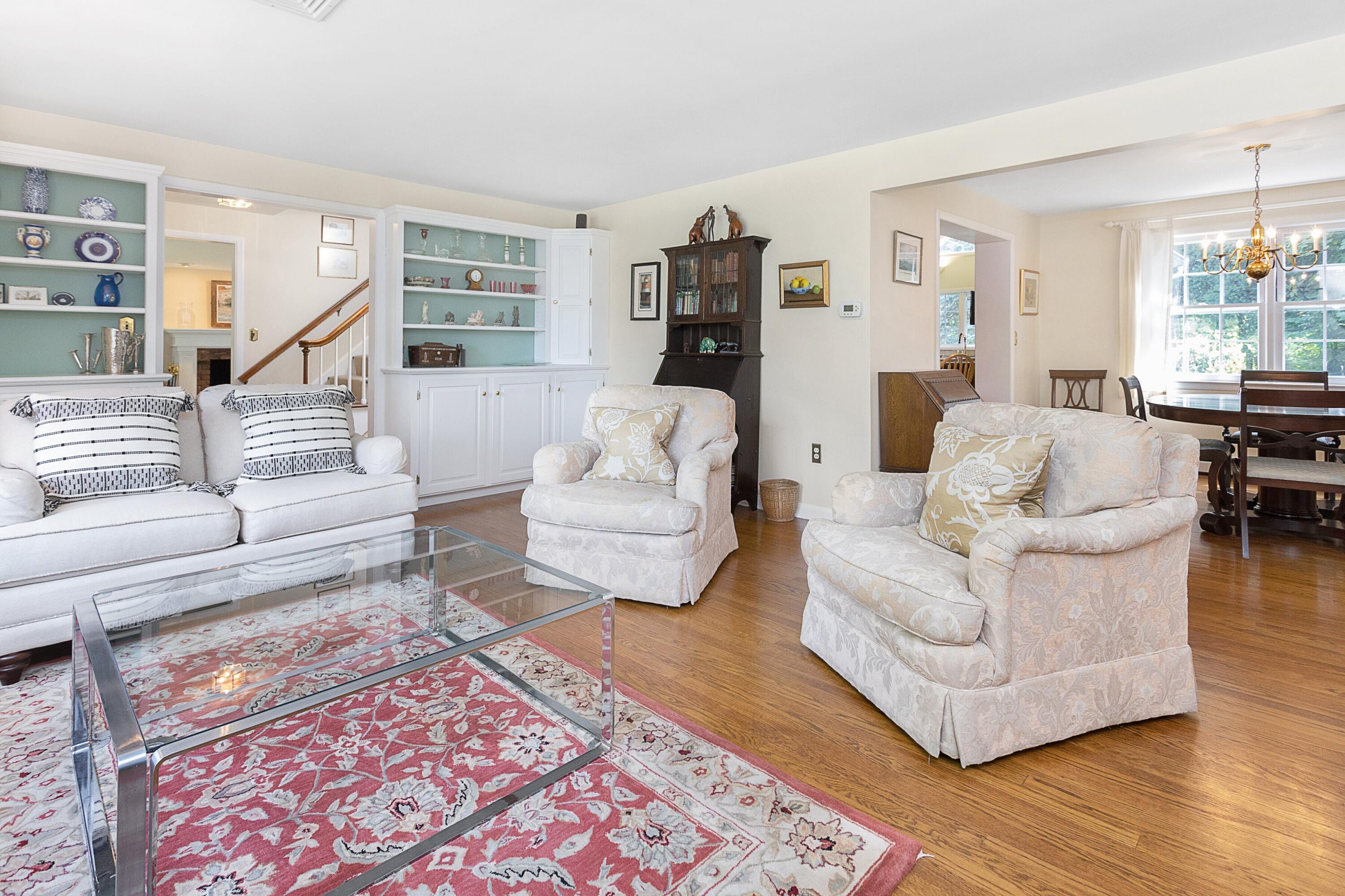 10 Wilson Ridge Road East Darien, CT 06820 - Photo 11 of 25 a living room with furniture and a rug