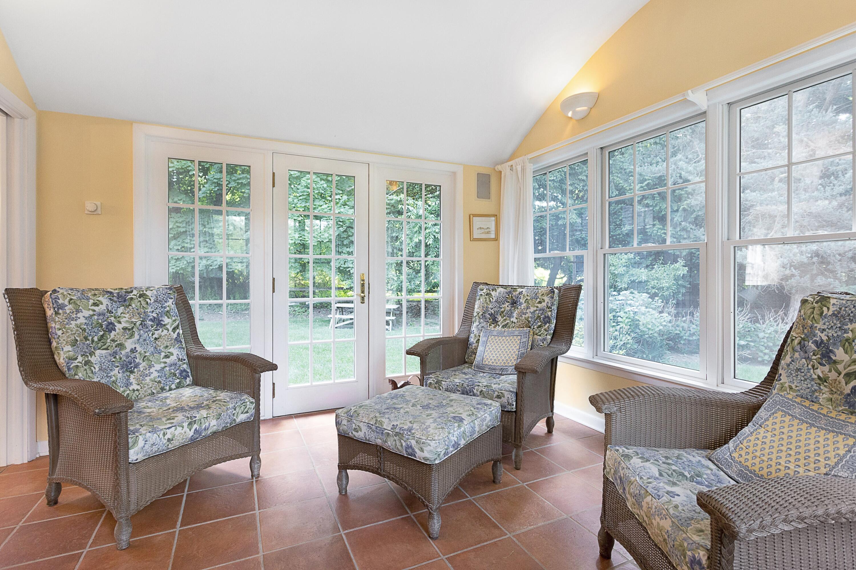 10 Wilson Ridge Road East Darien, CT 06820 - Photo 12 of 25 a living room with furniture and a large window