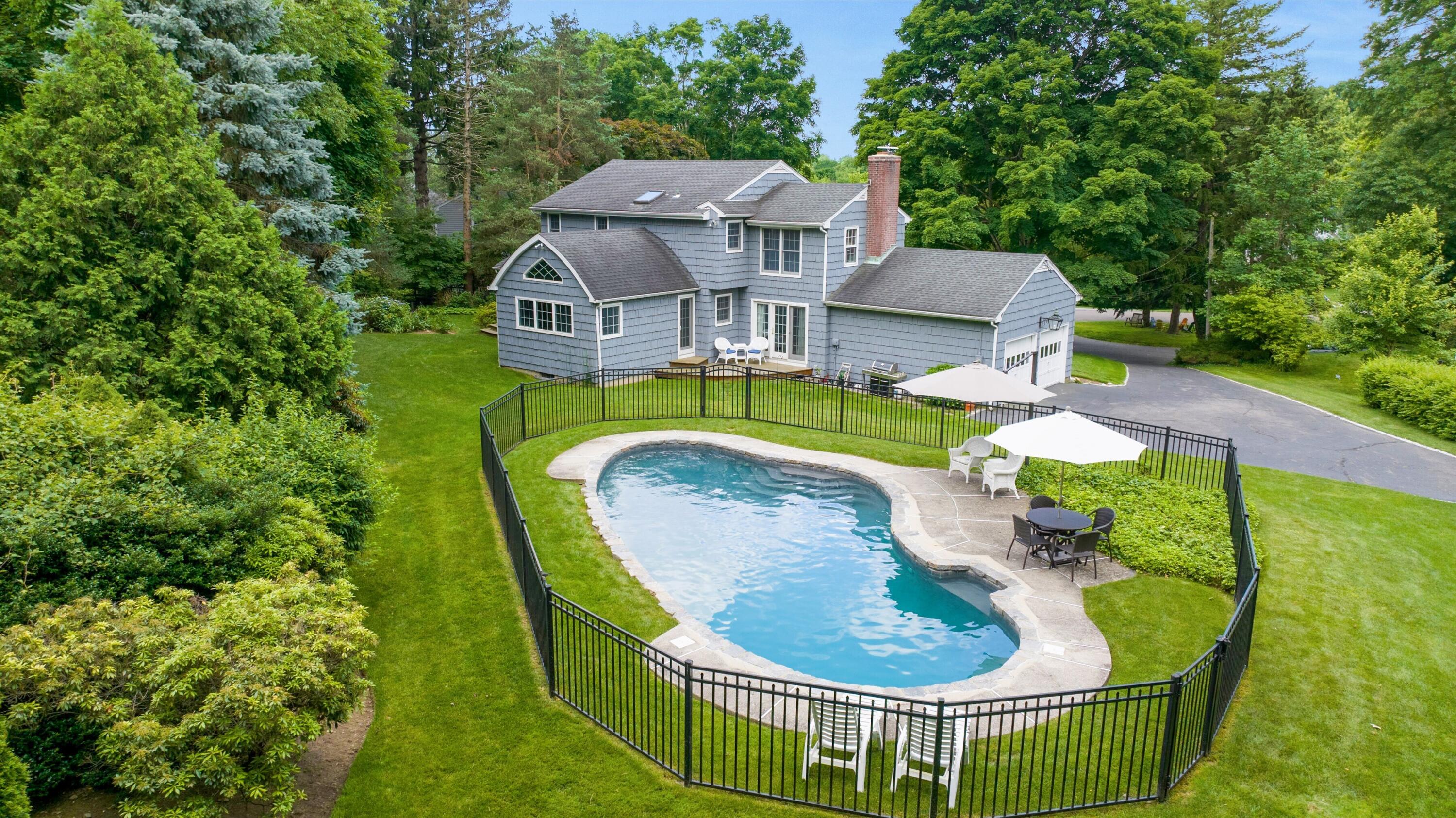 10 Wilson Ridge Road East Darien, CT 06820 - Photo 2 of 25 an aerial view of a house having outdoor space