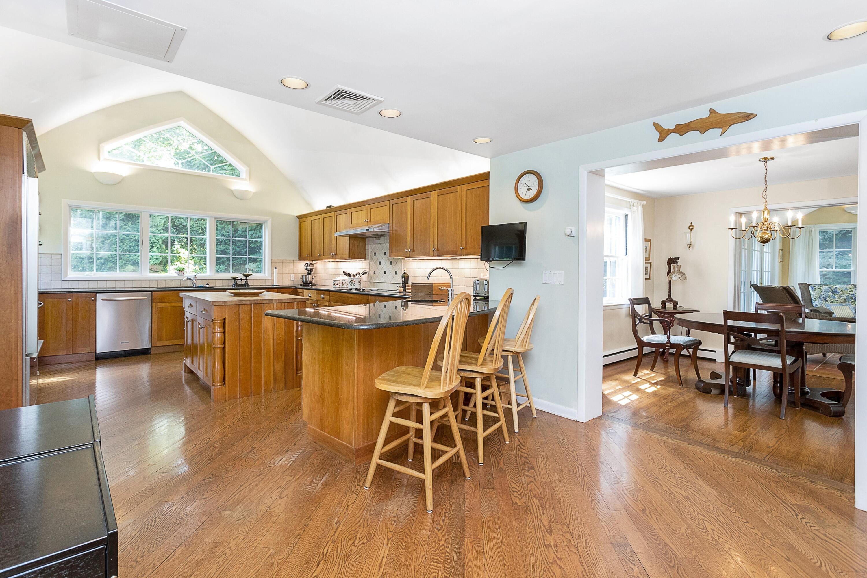 10 Wilson Ridge Road East Darien, CT 06820 - Photo 9 of 25 a view of a dining room with furniture window and wooden floor
