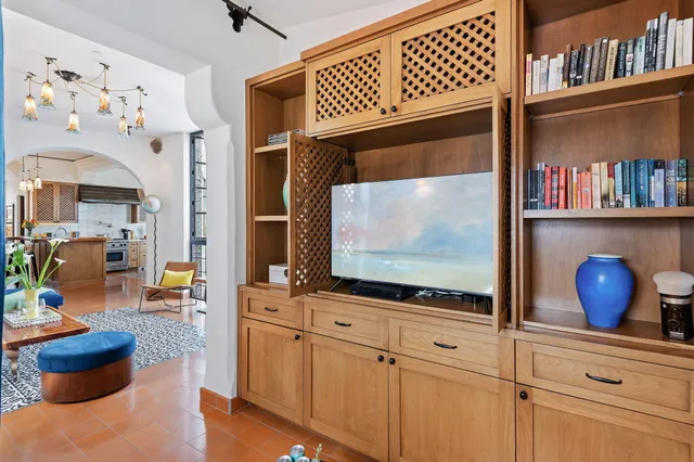 a very nice looking dining room with a table and chairs