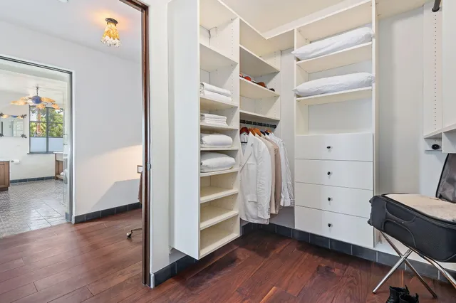 a view of entryway with stairs and wooden floor