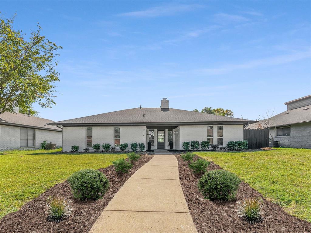 a view of a house with a big yard