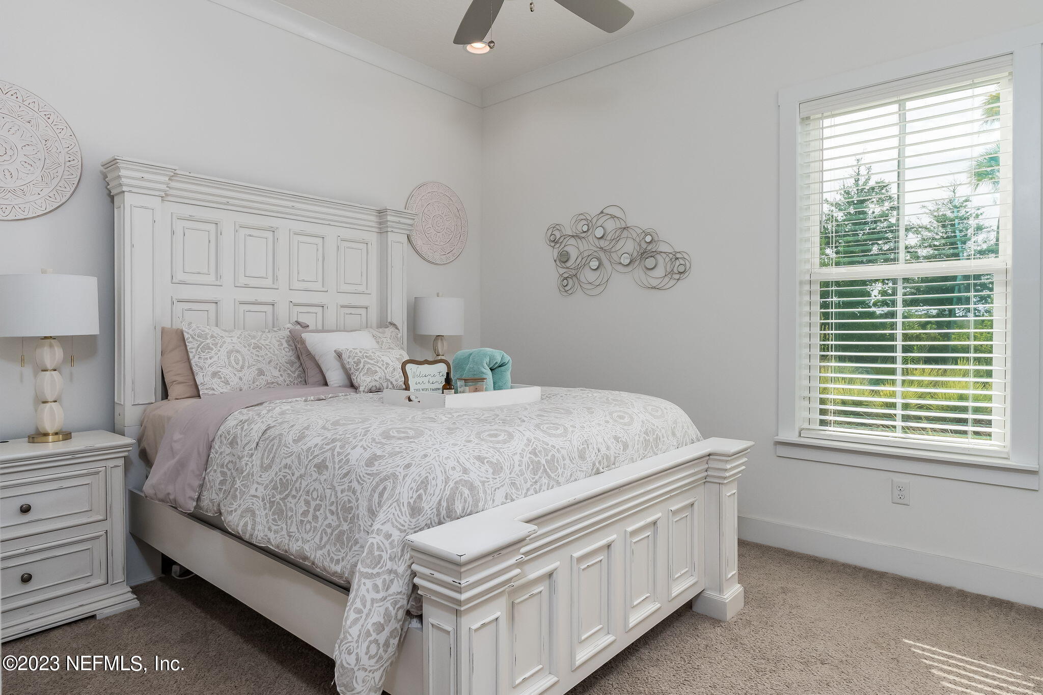 57 Topside Dr. St. Johns, FL 32259 - Photo 21 of 46 a bedroom with a bed and a window