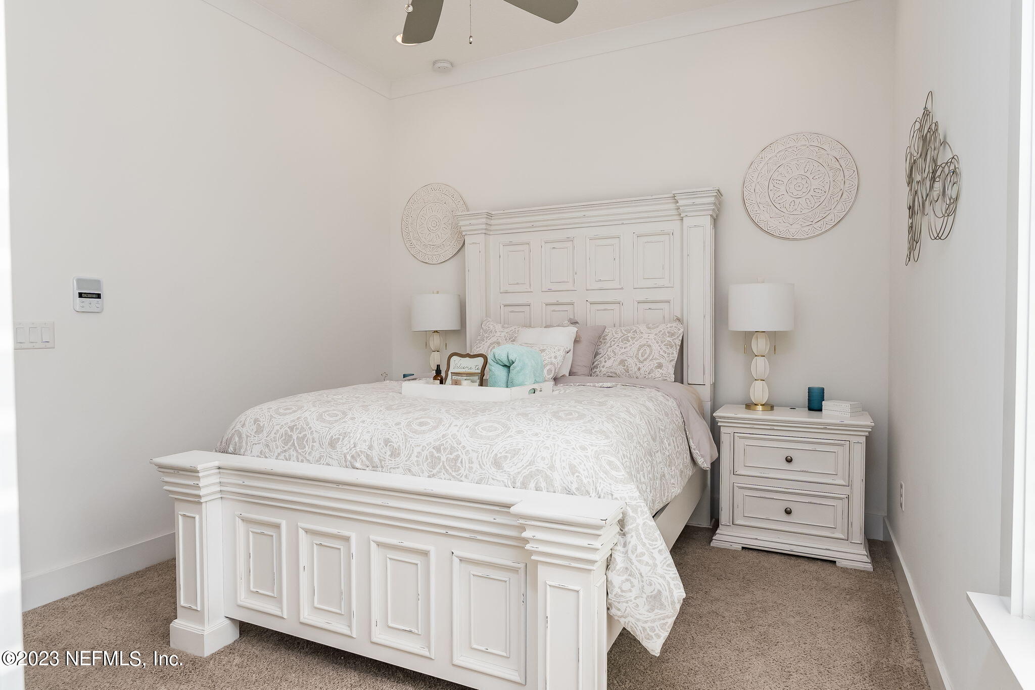 57 Topside Dr. St. Johns, FL 32259 - Photo 22 of 46 a bedroom with a bad and dresser