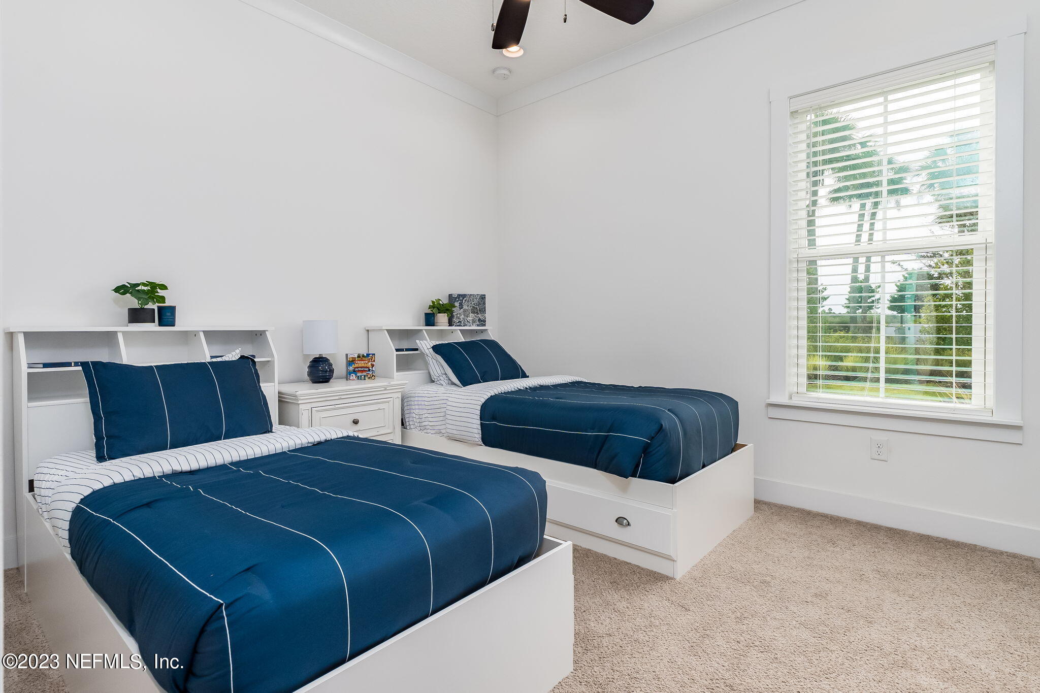 57 Topside Dr. St. Johns, FL 32259 - Photo 25 of 46 a bedroom with two beds and a window