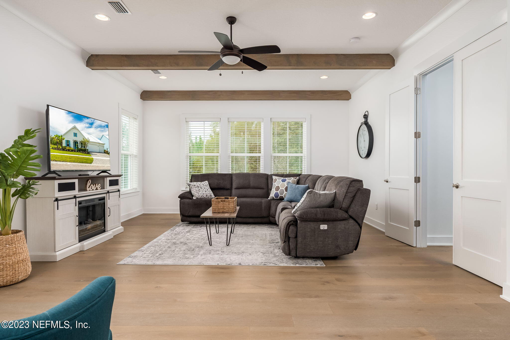 57 Topside Dr. St. Johns, FL 32259 - Photo 29 of 46 a living room with furniture and a flat screen tv