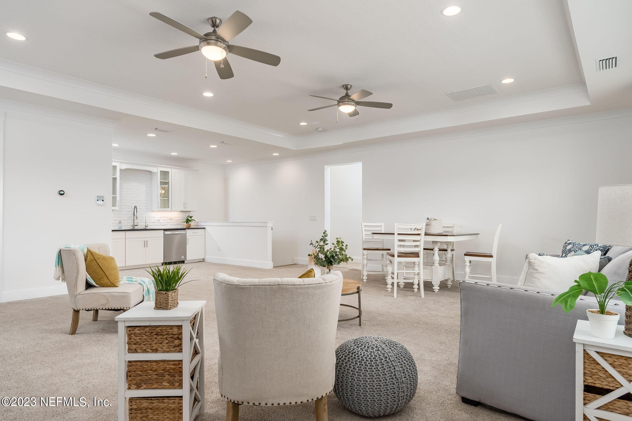 57 Topside Dr. St. Johns, FL 32259 - Photo 34 of 46 a living room with furniture a dining table and a fireplace
