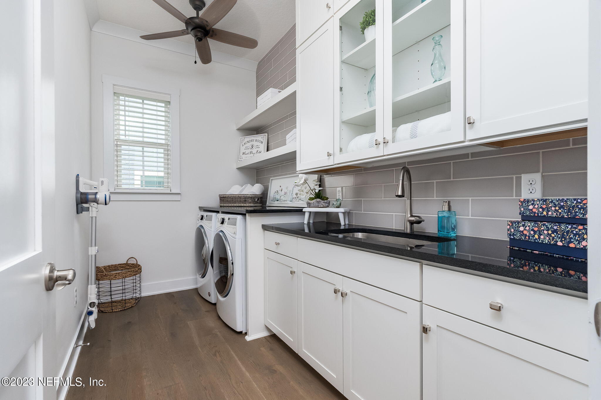 57 Topside Dr. St. Johns, FL 32259 - Photo 39 of 46 a kitchen with stainless steel appliances white cabinets and a sink