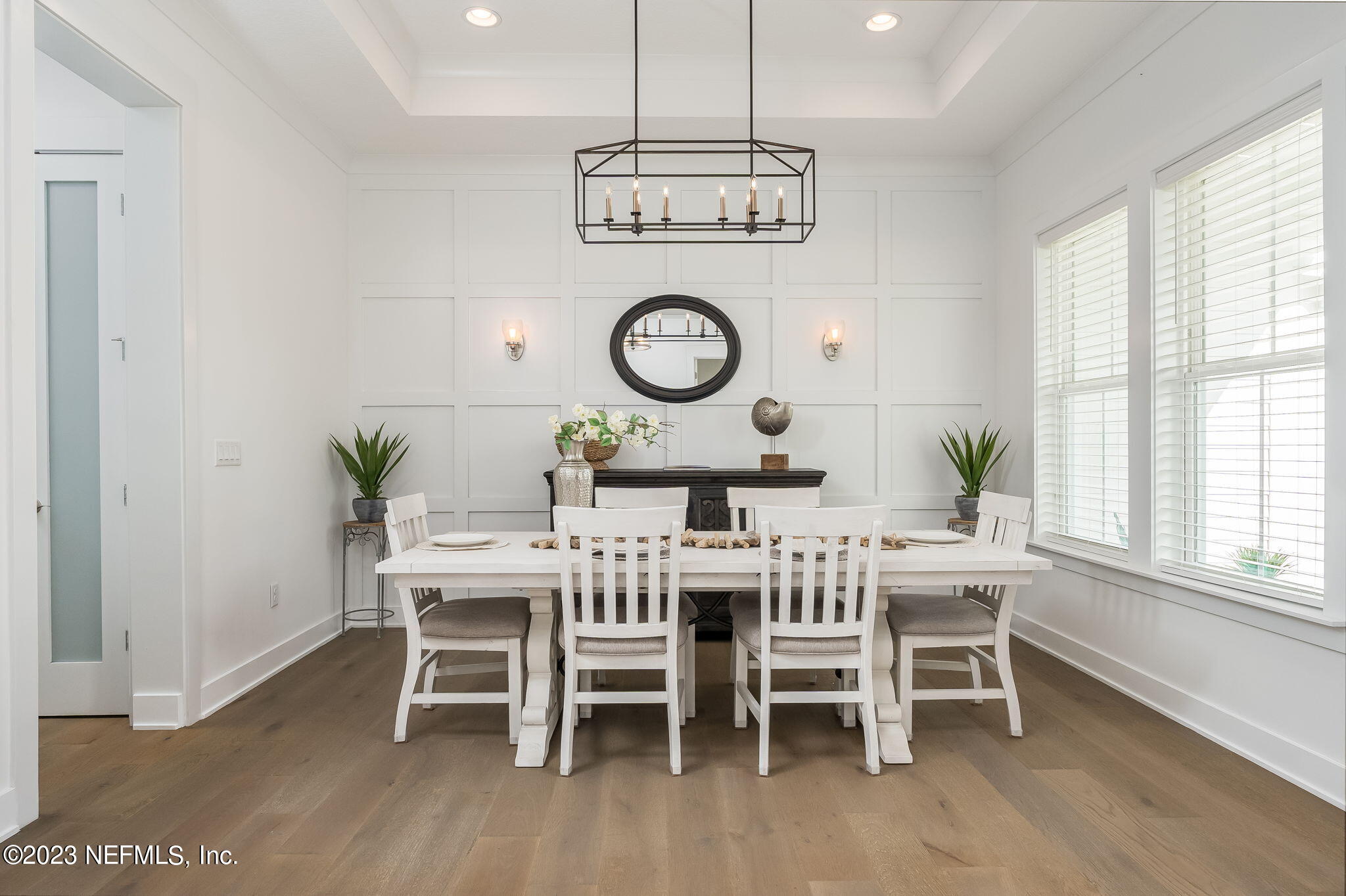 57 Topside Dr. St. Johns, FL 32259 - Photo 4 of 46 a view of a dining room with furniture window and wooden floor