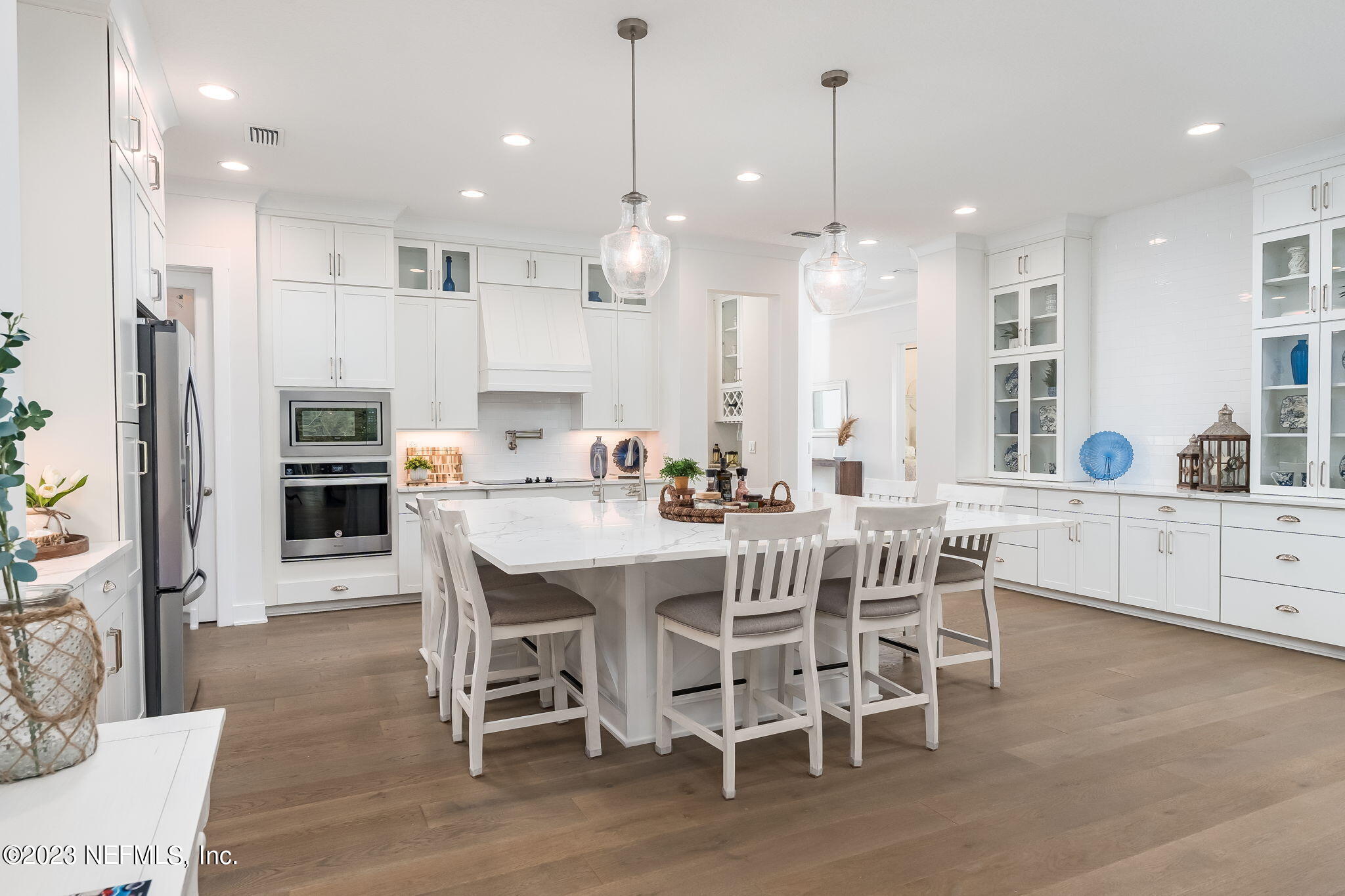 57 Topside Dr. St. Johns, FL 32259 - Photo 6 of 46 a large kitchen with a table and chairs