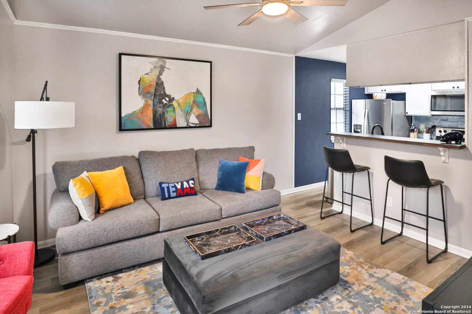 4803 Hamilton Wolfe Road, Unit 802 San Antonio, TX 78229 - Photo 1 of 1 a living room with furniture and kitchen view