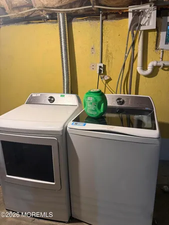 a utility room with a washer and dryer
