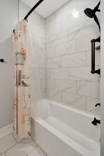 a bathroom with a bathtub