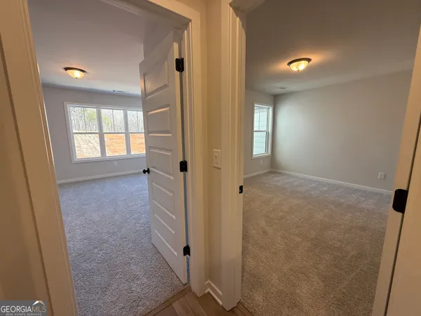 a view of empty room with closet