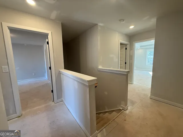 a view of hallway with washer and dryer