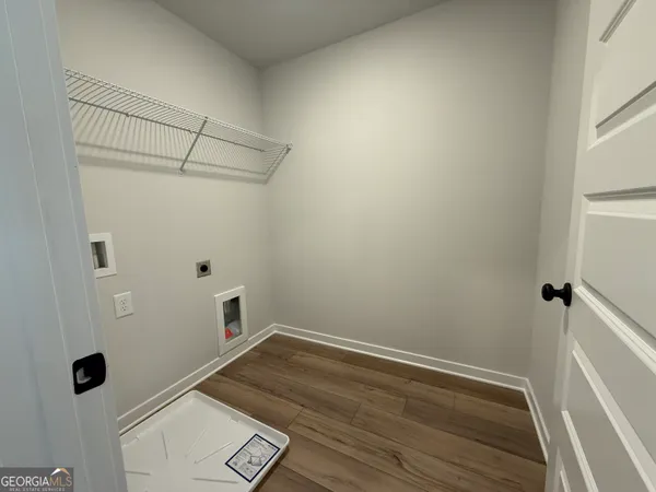 a view of empty room with windows