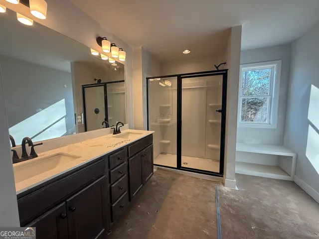 a view of a bathroom from a hallway