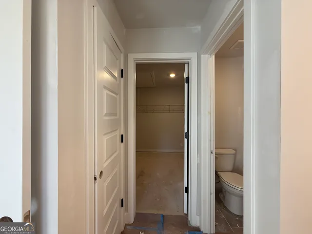 a view of a room with racks on the wall