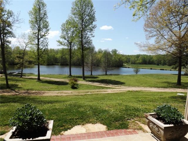 1278 Spence Road Camden, TN 38320 - Photo 11 of 20 a view of a park with large trees