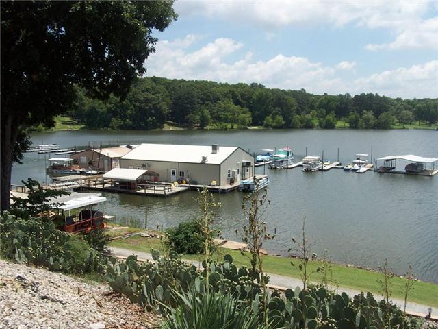 1278 Spence Road Camden, TN 38320 - Photo 3 of 20 an aerial view of a house with a lake view