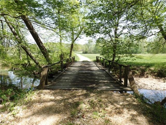 1278 Spence Road Camden, TN 38320 - Photo 5 of 20 a view of a yard with trees