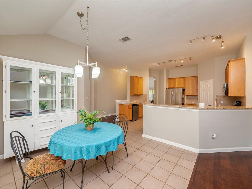 2206 Boneset Trail Round Rock, TX 78665 - Photo 16 of 35 a living room with furniture and a chandelier