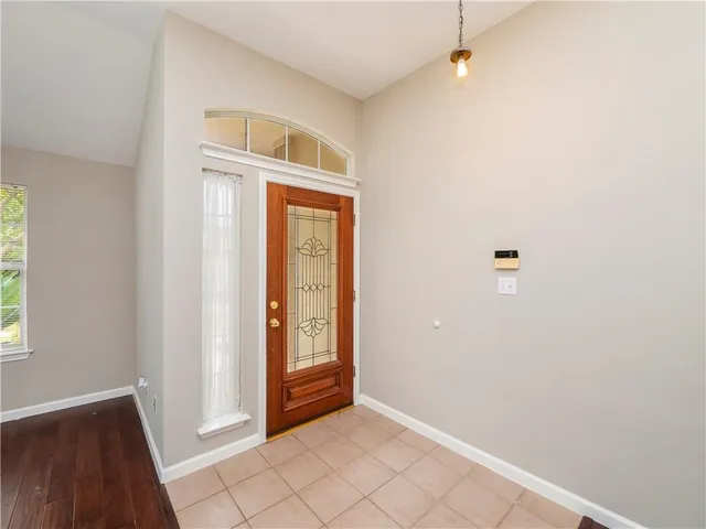 an empty room with windows