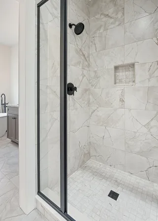 a spacious bathroom with a bathtub and sink