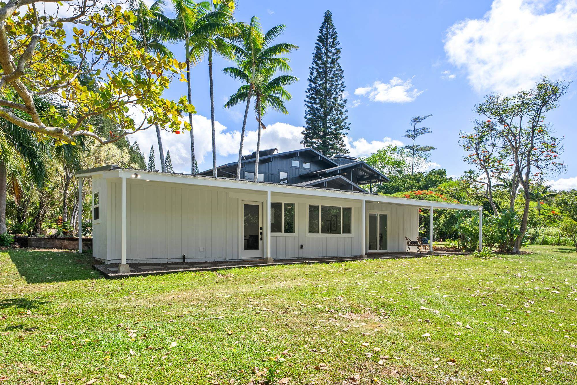 965 Hog Back Road Haiku, HI 96708 - Photo 28 of 44 a view of a house with a yard