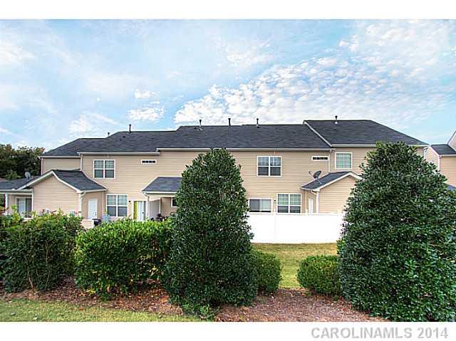 146 Council House Road, Unit 168 Fort Mill, SC 29708 - Photo 14 of 16 a front view of a house with a yard and garage