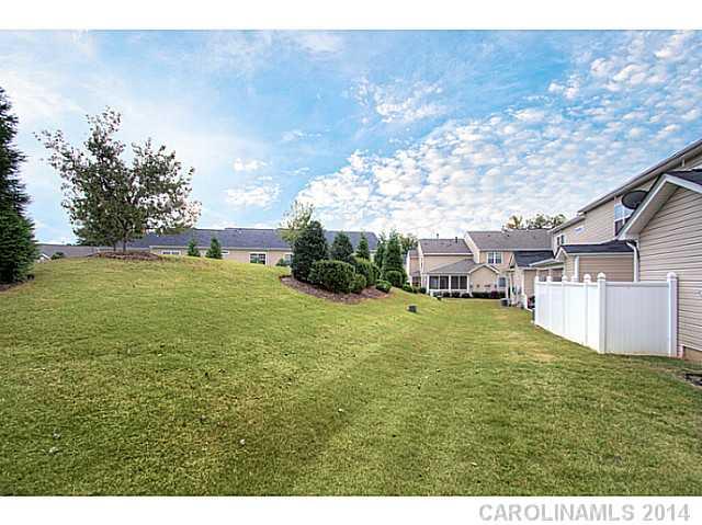 146 Council House Road, Unit 168 Fort Mill, SC 29708 - Photo 15 of 16 a view of a house with a yard