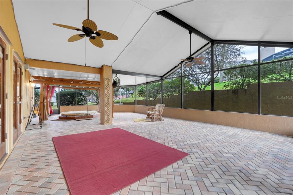 1207 Overlook Road Eustis, FL 32726 - Photo 14 of 44 a swimming pool with a outdoor seating