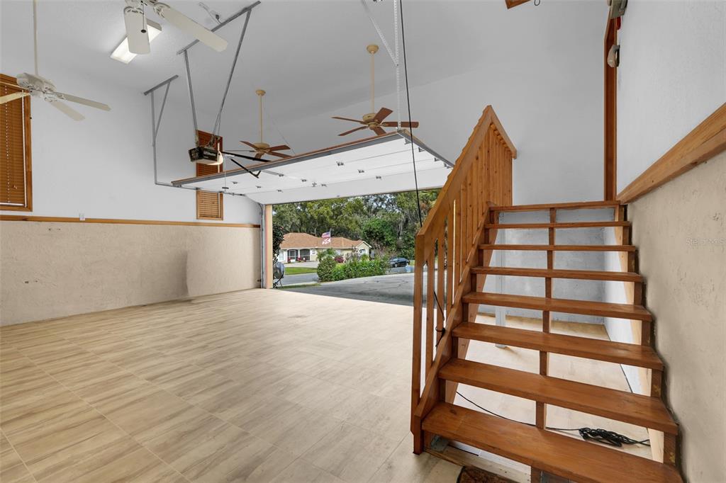 1207 Overlook Road Eustis, FL 32726 - Photo 30 of 44 a view of entryway and hall with wooden floor